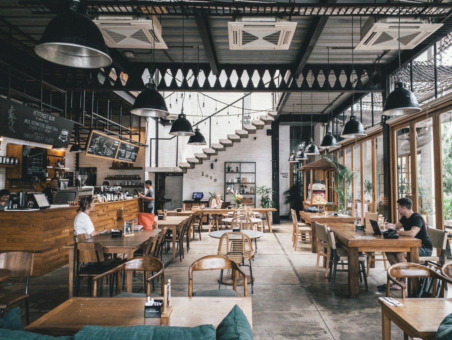 Set dining tables inside Brightwildlife restaurant