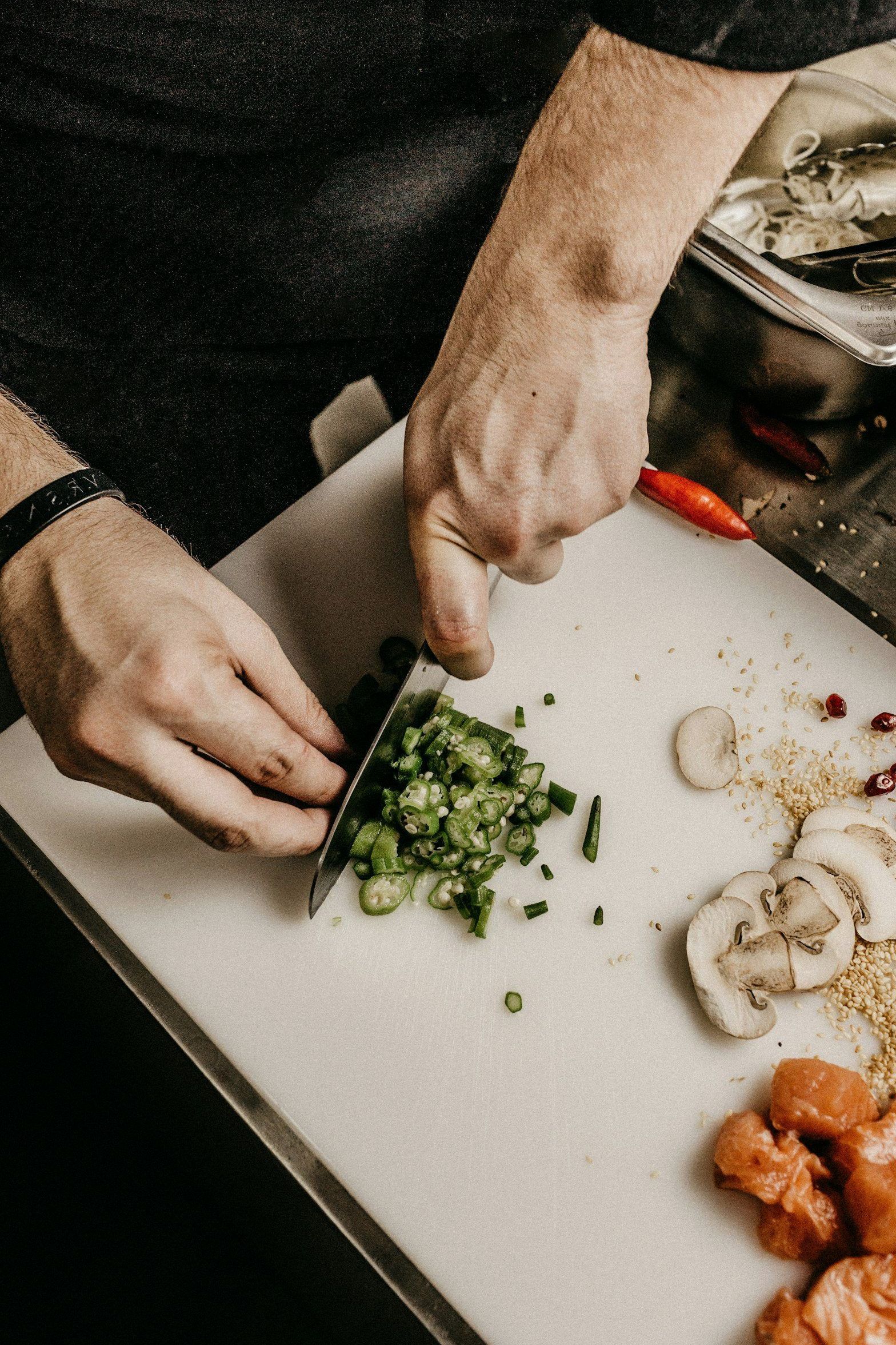 A chef carefully plating a dish at Brightwildlife