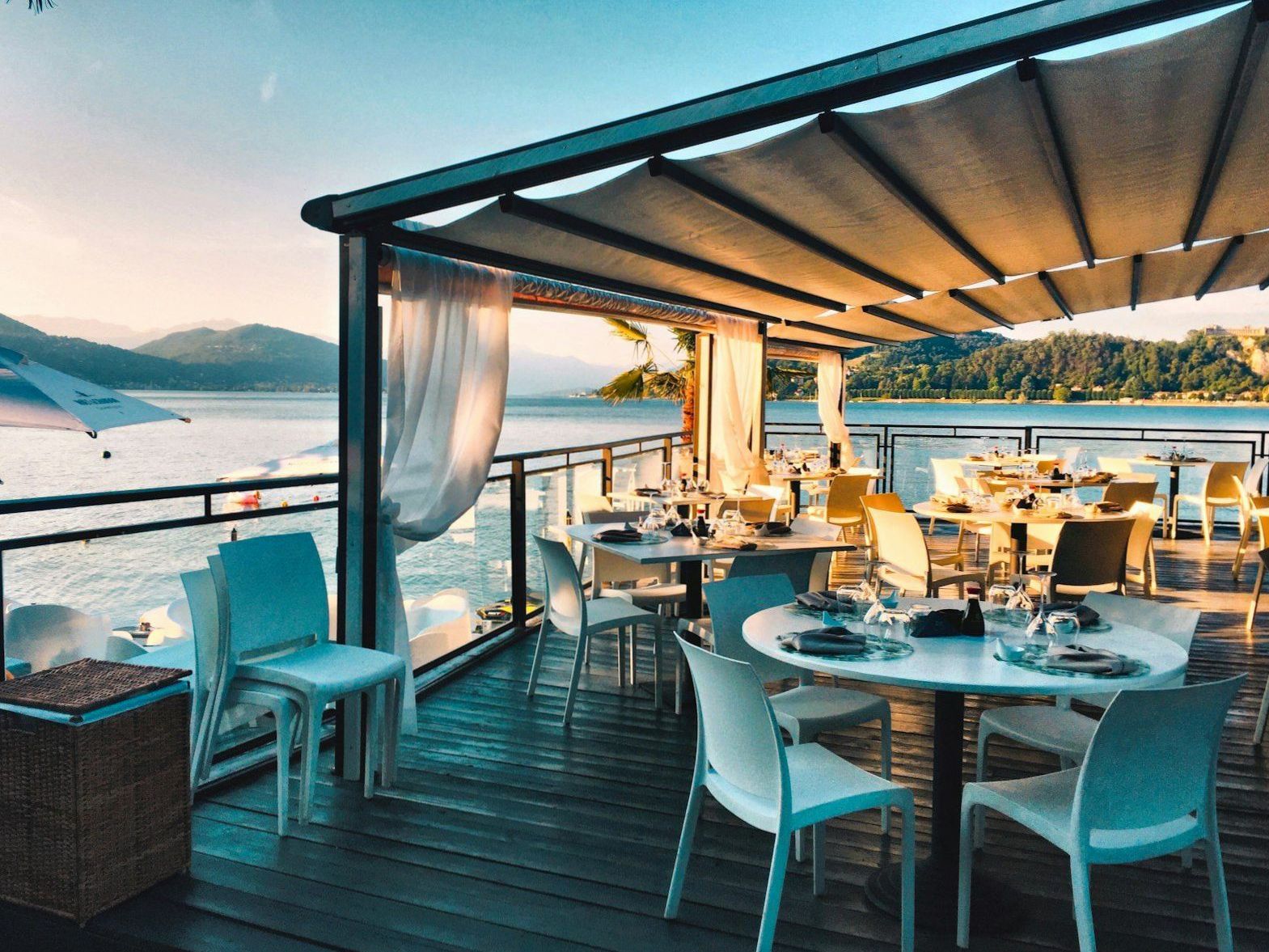 Outdoor restaurant terrace with a waterfront view in Auckland